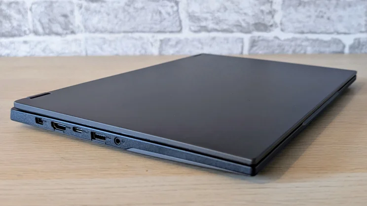 The Asus TUF Gaming A14 RTX 5060 laptop pictured from the left front corner, closed