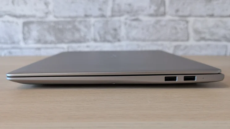 The Honor MagicBook Pro 14, closed pictured from the right