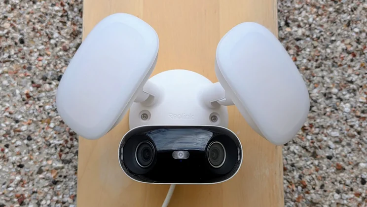 Reolink Elite Floodlight WiFi mounted on a wood board