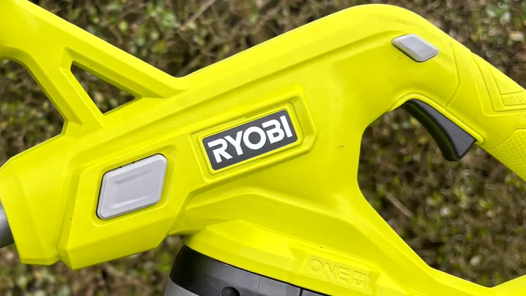Ryobi RY18LT23A-0 grass trimmer - close-up of handle/buttons