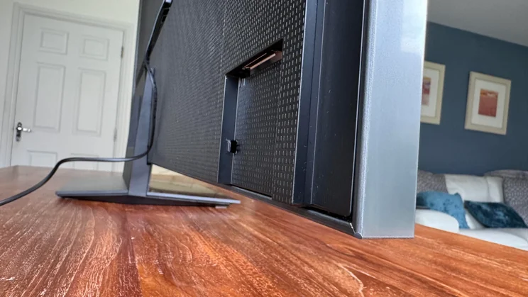 Close-up of the bottom corner of the Samsung R95H Micro LED TV from the side/rear