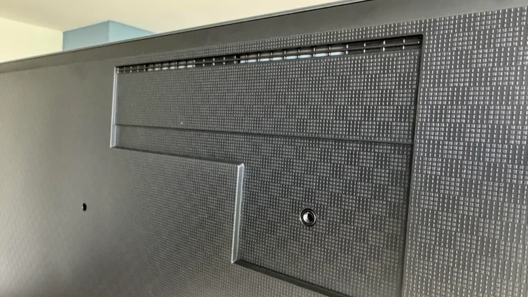 Rear view of the Samsung R95H Micro LED TV showing the insert into which its wall mount goes