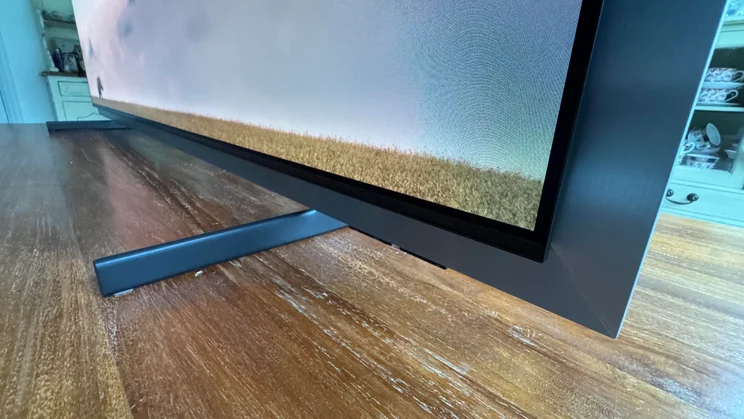 Close-up of the bottom-right corner of the Samsung S99H quantum dot OLED TV