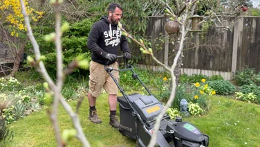 Man mowing his grass