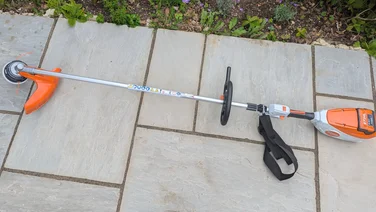 Stihl FSA80R - review full front of strimmer on a patio
