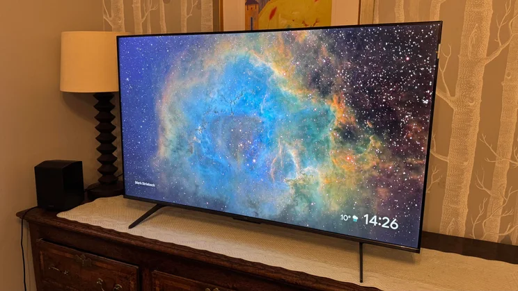 Right view of the TCL C6KS Mini LED TV displaying a colourful scene in outer space