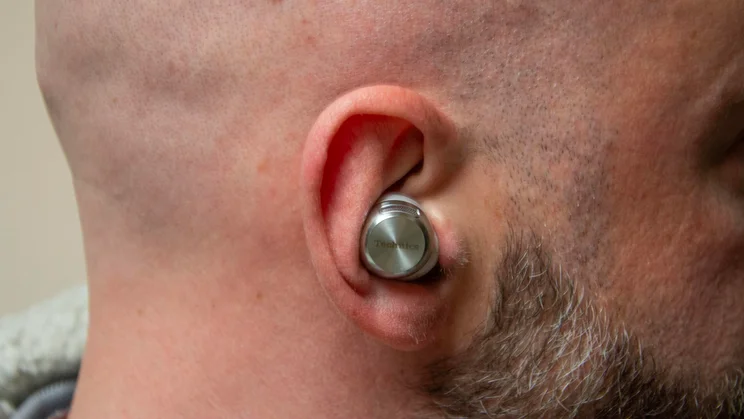 Our reviewer wearing one of the Technics EAH-AZ100 wireless earbuds in his right ear
