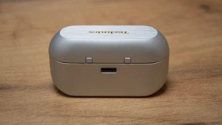 Rear view of the Technics EAH-AZ100 wireless earbuds in their charging case with the lid closed