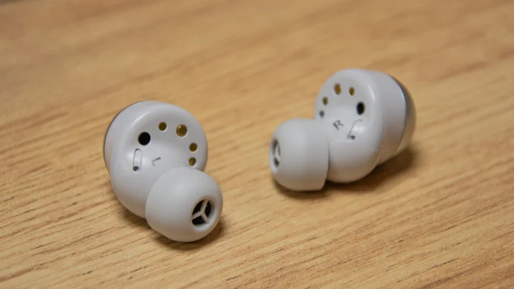 The Technics EAH-AZ100 wireless earbuds with both earbuds turned inwards to show the silicone eartips