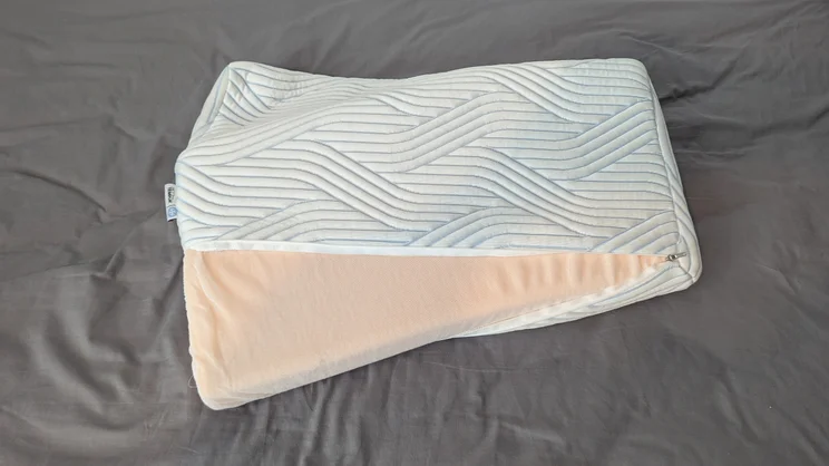 The Tempur Original SmartCool Pillow, cover unzipped and inside exposed