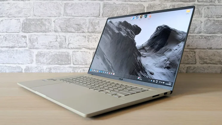 The Asus Zenbook A16, open, pictured from the front right quarter