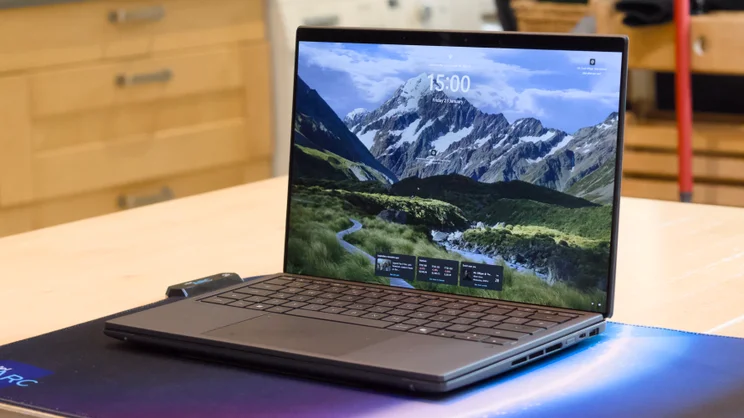 The Asus Zenbook Duo 2026 in laptop mode, pictured on a kitchen table