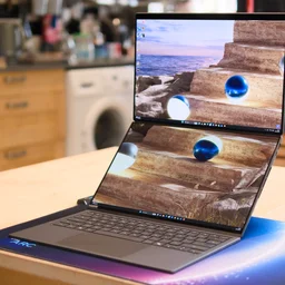 The Asus Zenbook Duo 2026, open fully on a kitchen table