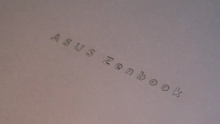 The Asus Zenbook logo stencilled into the lid of the Asus Zenbook Duo 2026, close up