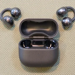 The Huawei FreeClip 2 and charging case, open