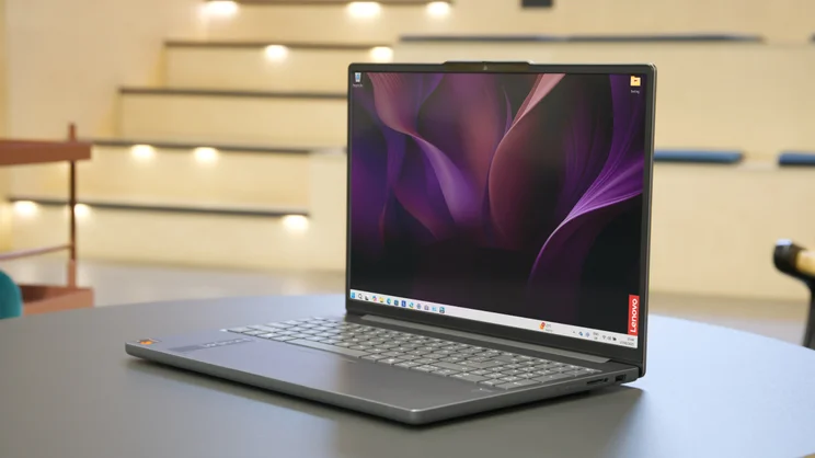 The Lenovo IdeaPad 3x 2025 pictured on a coffee table from the front right