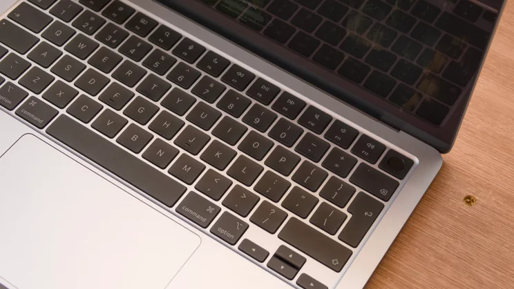 The M4 MacBook Air pictured from above, open, focusing on the right portion of the keyboard