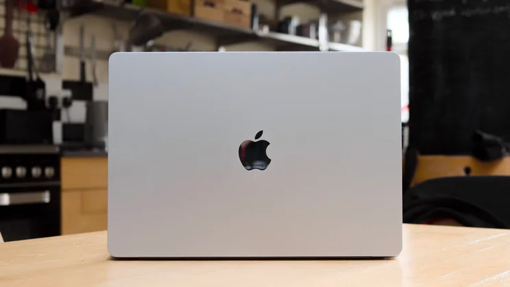 The M5 MacBook Air, open, pictured from the rear