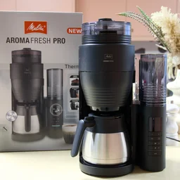 The Melitta AromaFresh Therm Pro pictured in a kitchen next to its box