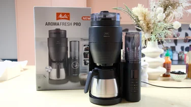 The Melitta AromaFresh Therm Pro pictured in a kitchen next to its box