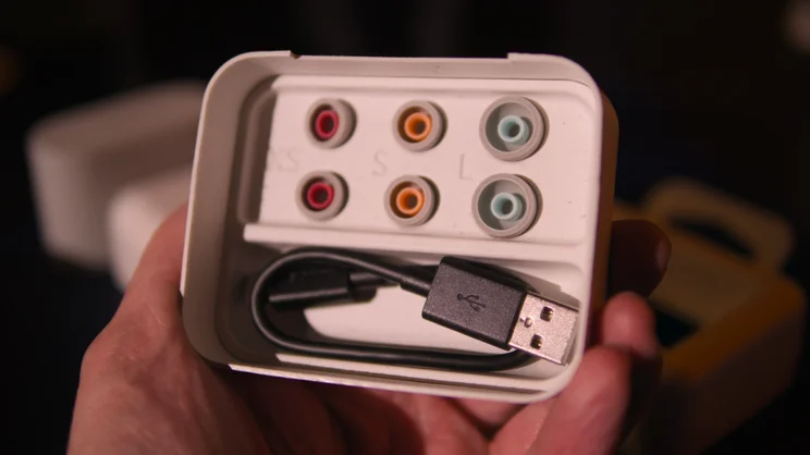 The Sony WF-1000XM6's box with charging cable and spare eartips