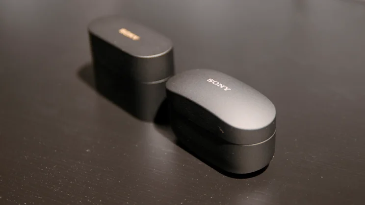 The Sony WF-1000XM6's case (left) pictured next to the WF-1000XM5