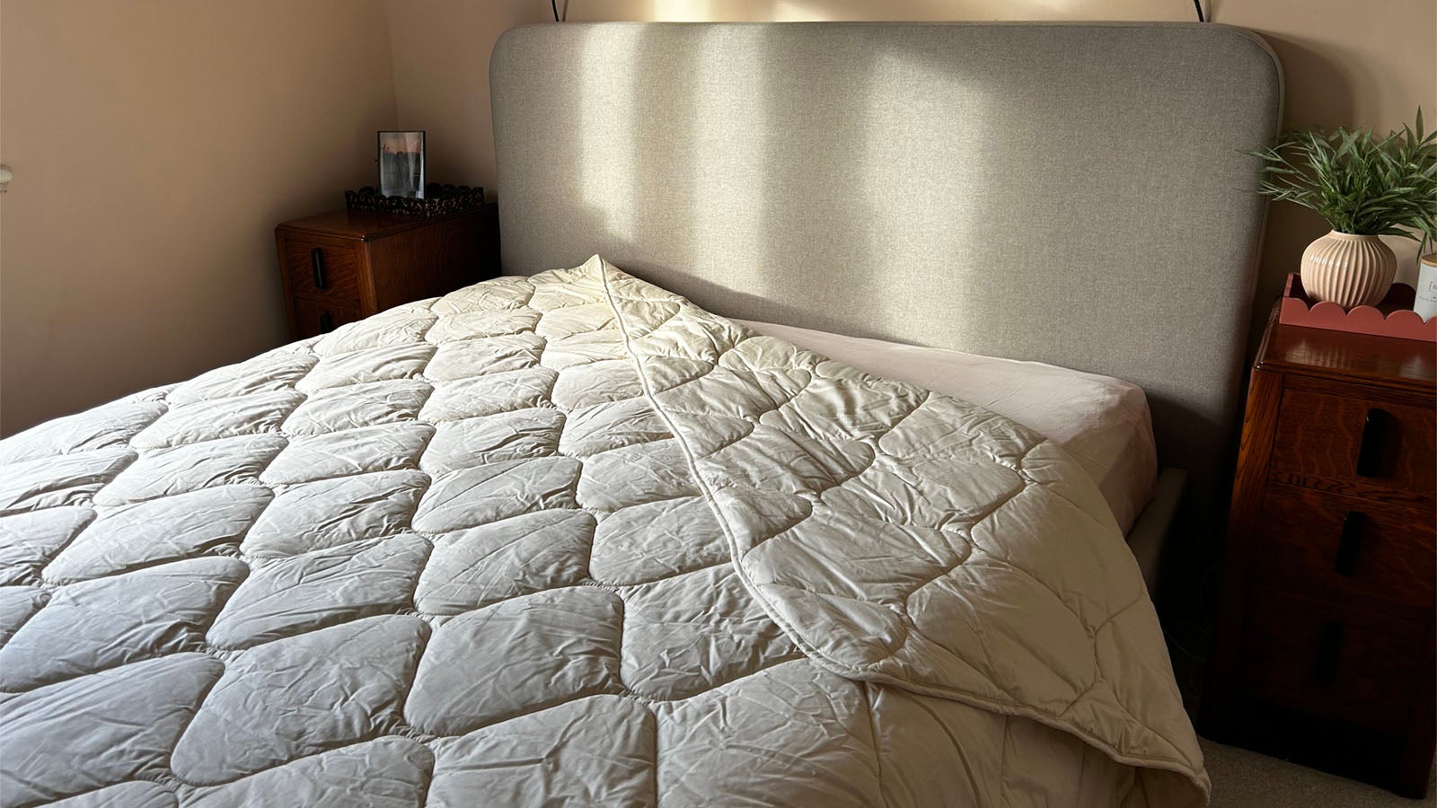 Woolroom Organic Washable Wool Duvet in a warmly lit room