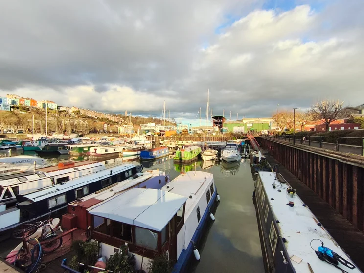 Ultrawide shot of a harbour full of boats on a sunny day