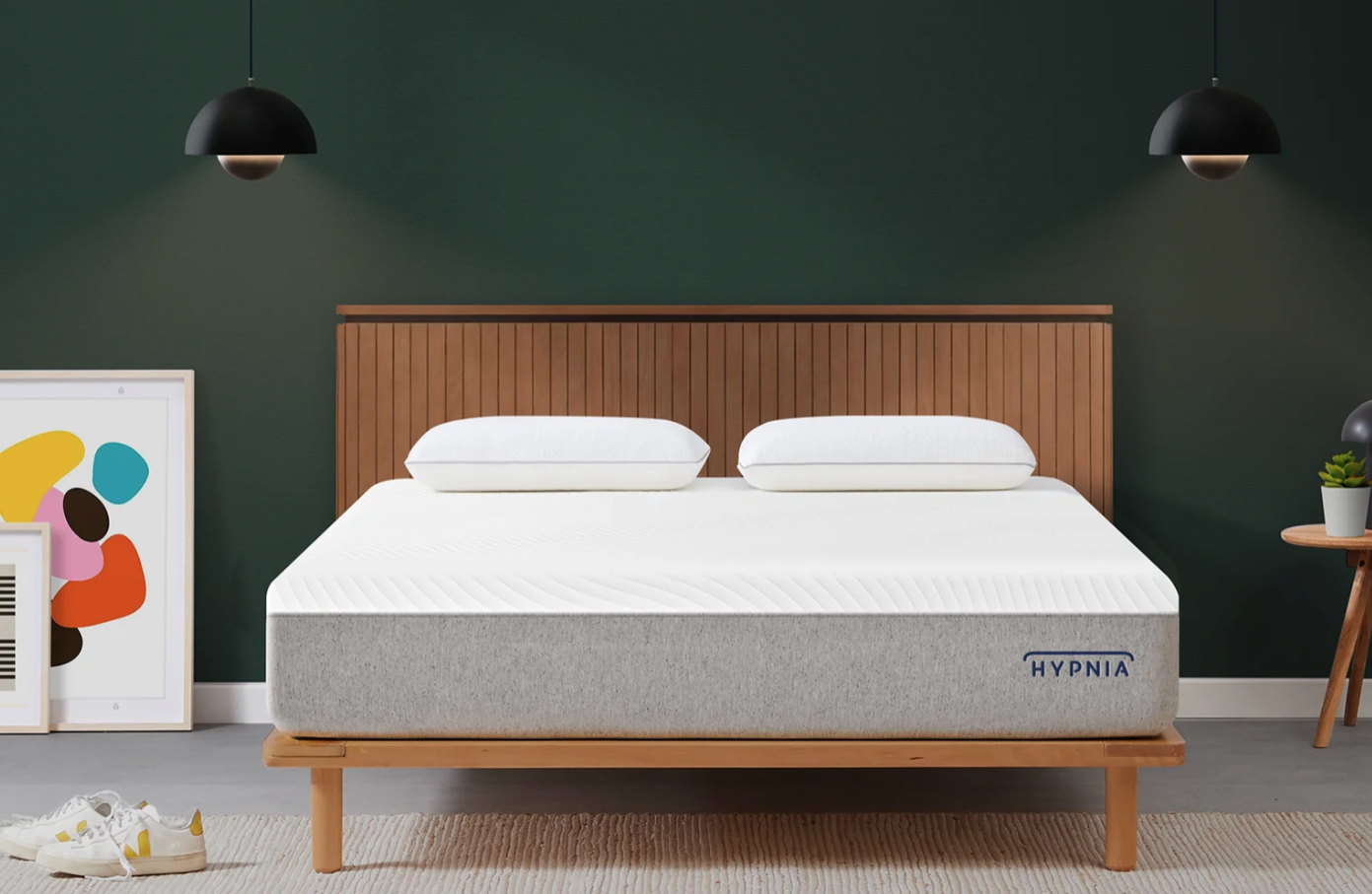 Bed with Hypnia Supreme mattress in bedroom