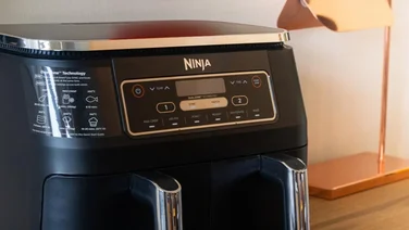 Close up image of a Ninja air fryer on a desk